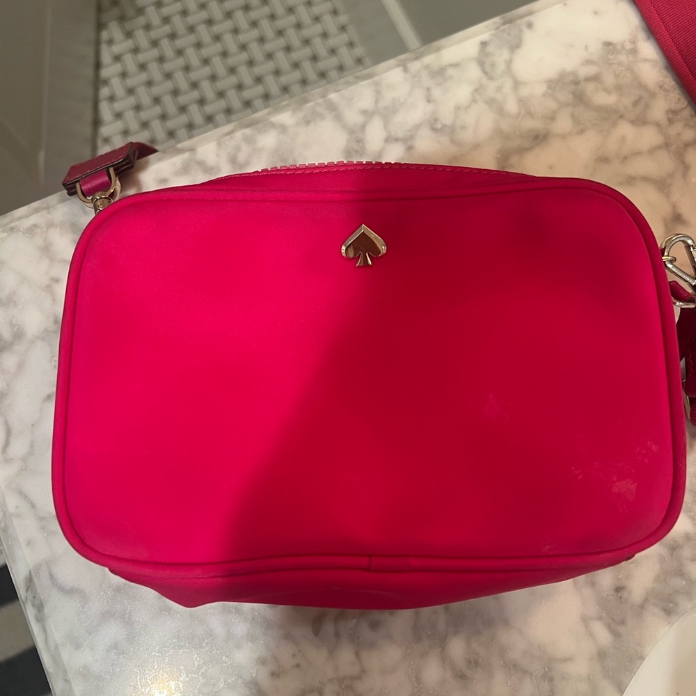 Kate Spade pink purse.